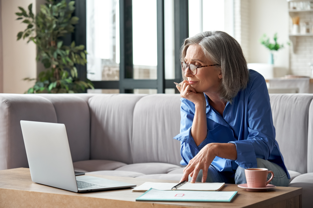 Older woman looking at laptop