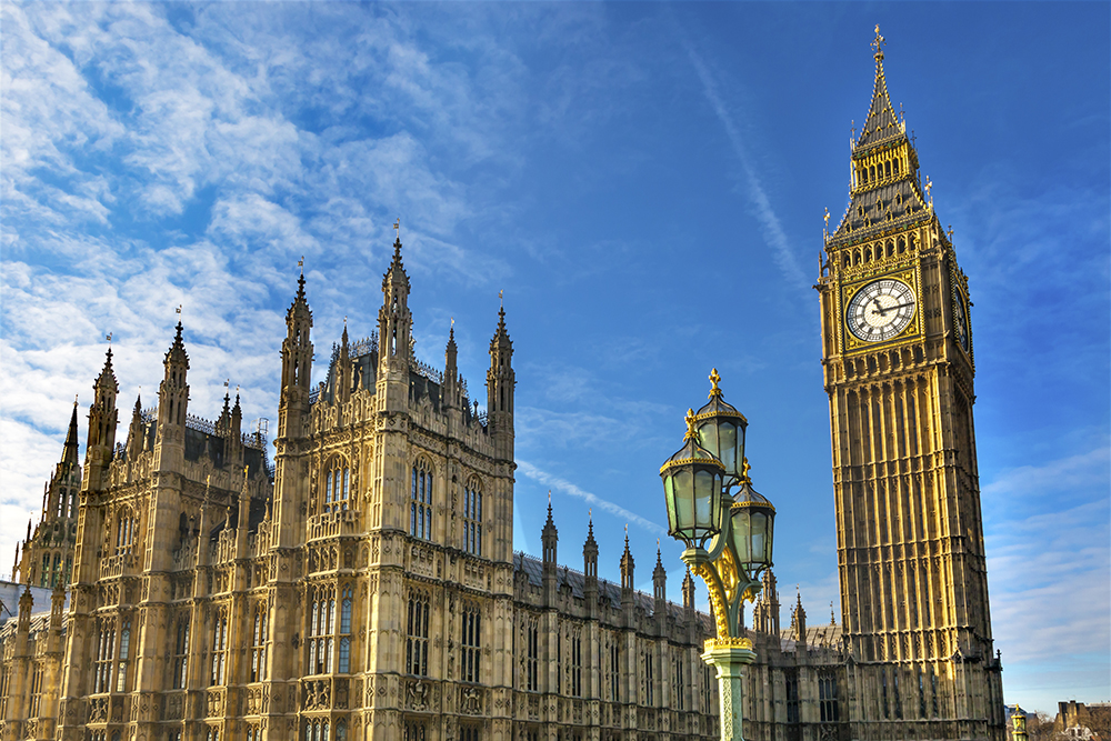 Big Ben Tower Houses of Parliament Lamp Post Westminster Bridge Westminster London England. Named after the Bell in the Tower. Has kept exact time since 1859.